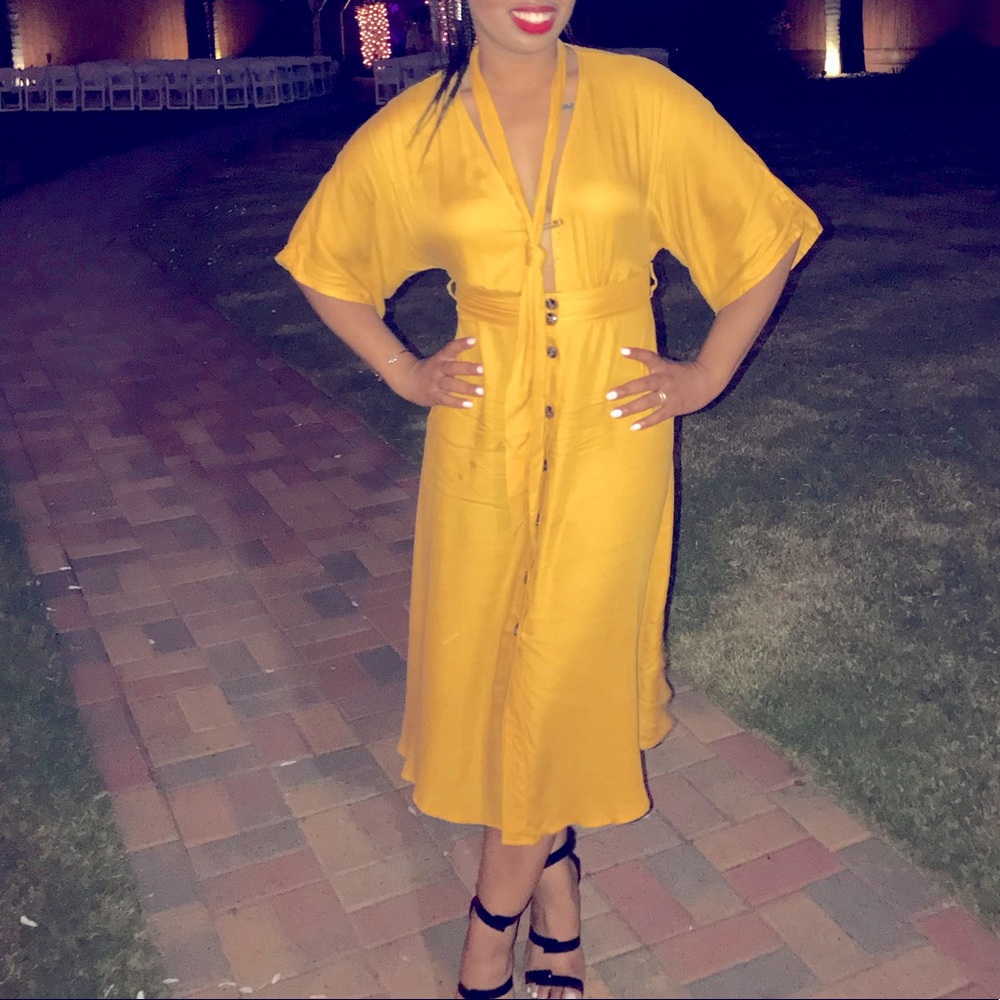 Yellow low cut dress